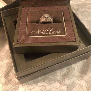 Neil Lane engagement ring, wedding band, and anniversary band.